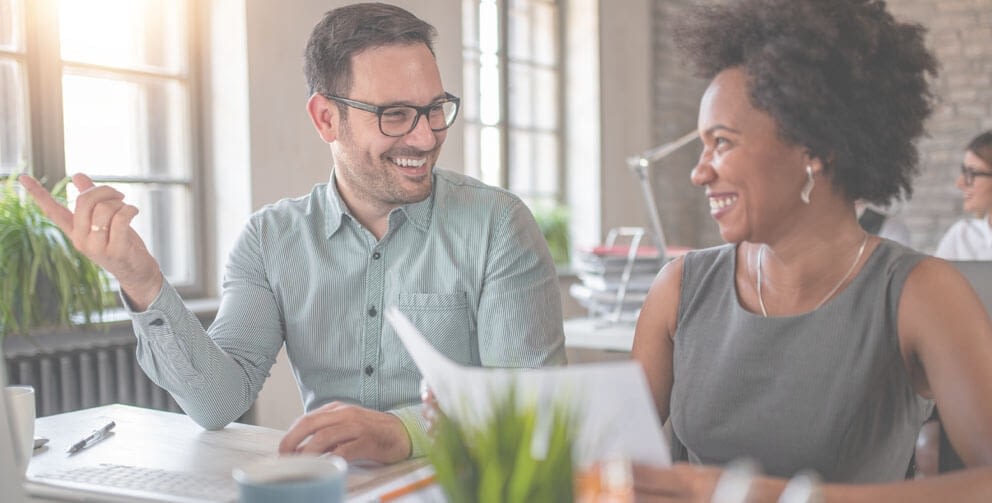 Two Businesses Partners Happy Discussing Funding